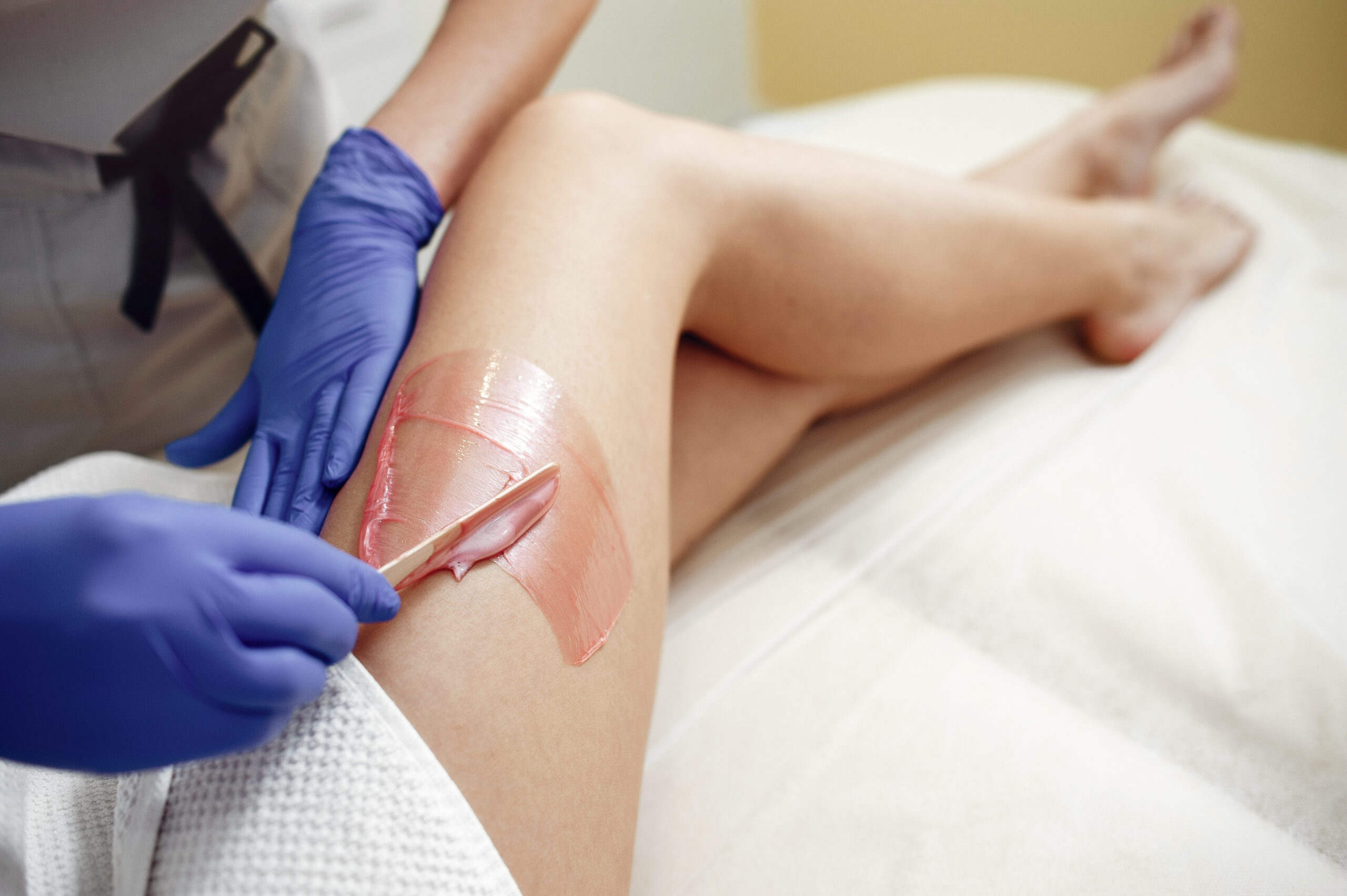 woman with leg waxed