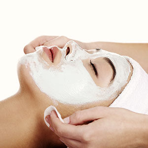 Woman getting a customized facial