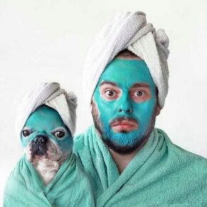 Man and dog enjoying beauty treatment