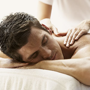 Man receiving massage therapy