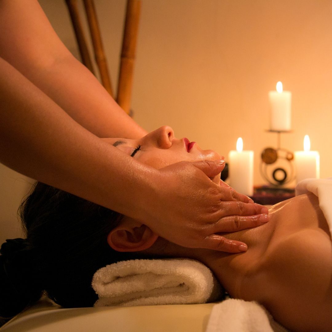 woman receiving neck massage