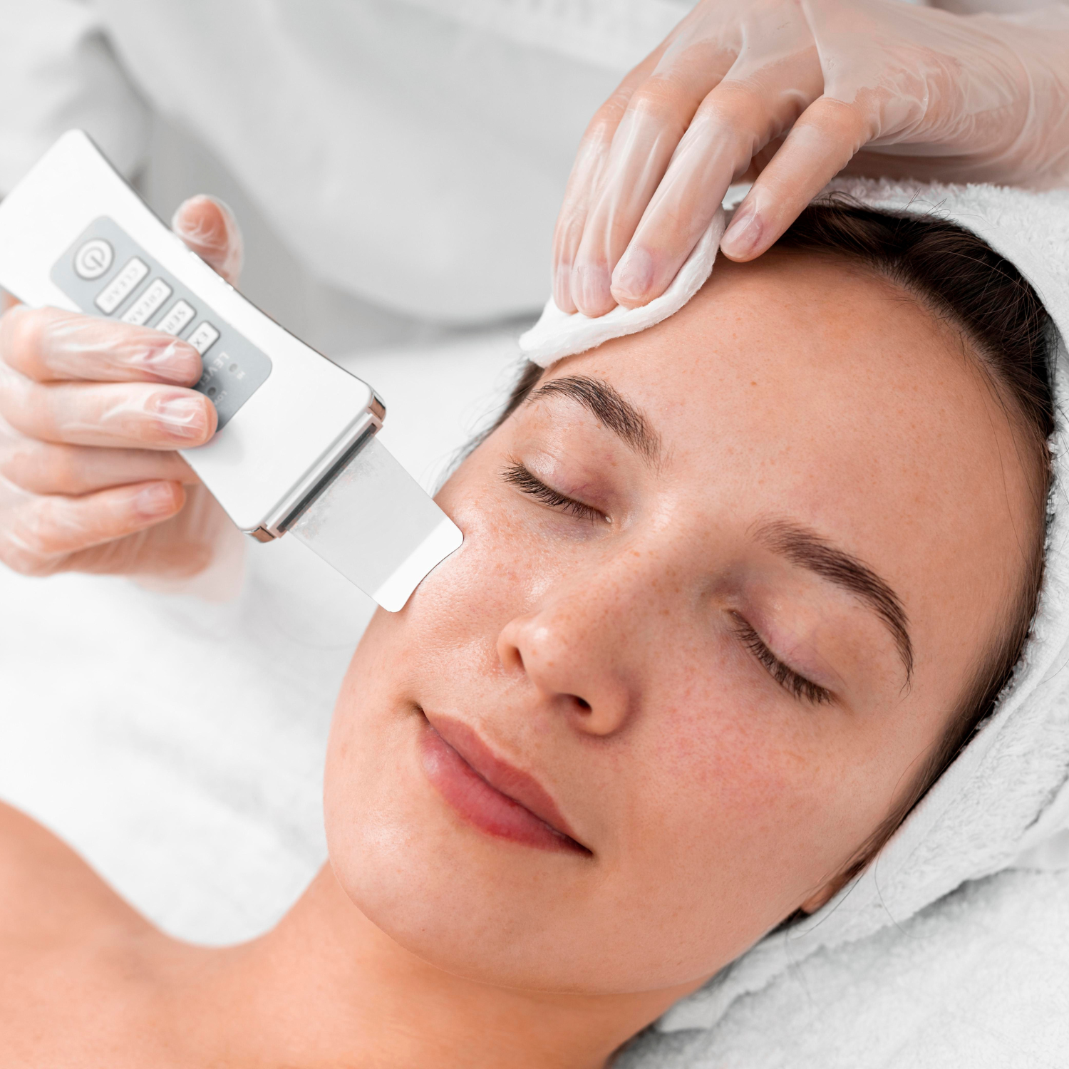 woman getting facial treatment