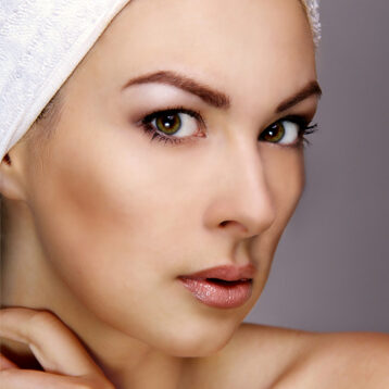 Woman with glowing skin after microdermabrasion
